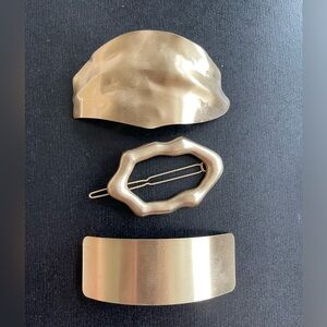 Gold statement hair clips